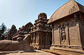 Mamallapuram - Tamil Nadu. The five Rathas. The group of Draupadi Ratha and Nandi the bull, the Arjuna Ratha, Bhima Ratha and Dharmaraja to the south.
